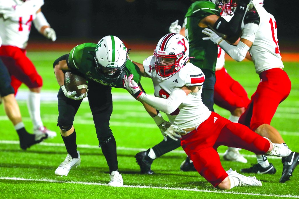 Norman North rolls past Yukon, 5728 Yukon Progress